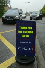 "Please park safely" sign outside Meadowbrook Primary School