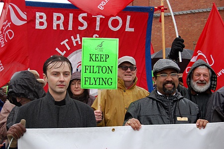 Bradley Stoke Town Councillor Tom Aditya (right) heads the march