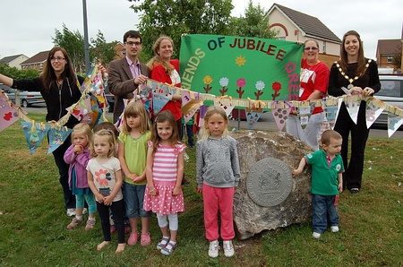 Plaque unveiled to mark dedication of Jubilee Green as a QEII Field in trust.