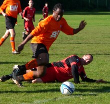 BSTFC's Lukas Entoundi skips past a challenge.