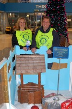 Members of Bristol Aztec Rotary Club with their wishing well.