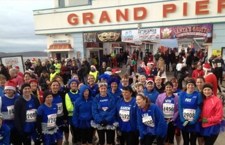 Members of Sole Sisters RC get ready to run the Wyvern Christmas Cracker.
