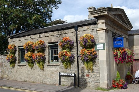 Floral display outside Parky's Chippy in Thornbury.