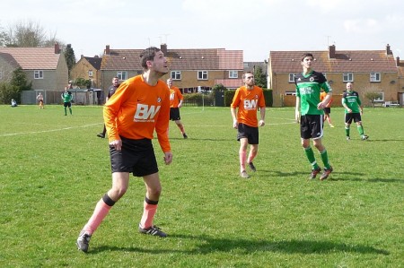 BSTFC First Team player Brad Clarke follows a high ball.