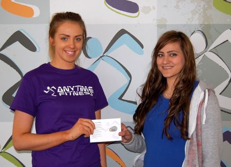 Anytime Fitness competition winner Leanne Robinson receives her prize.