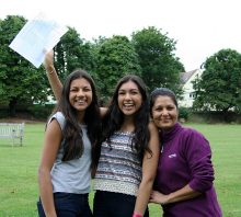 Red Maids' School GCSE results: Neha Mehta (centre) celebrates with her mother Sapna and younger sister Niki, also a Red Maid.