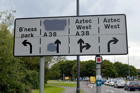 MetroBus build: Modified road sign on the southbound A38 at at Aztec West.