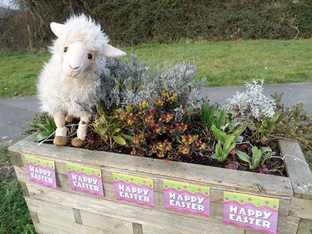 Welcome planter decorated for Easter by Bradley Stoke in Bloom.