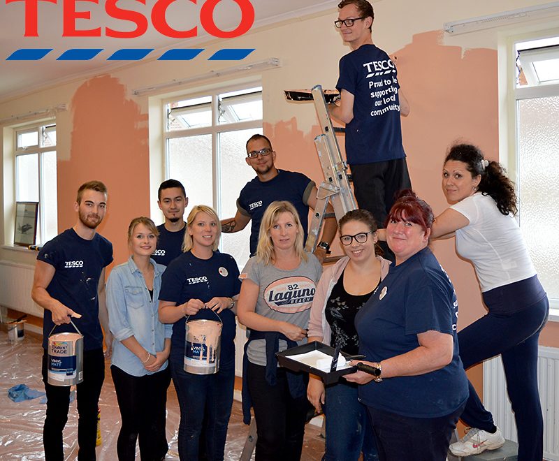 Staff from the Tesco Extra store in Bradley Stoke decorate a room at Patchway Community Centre.