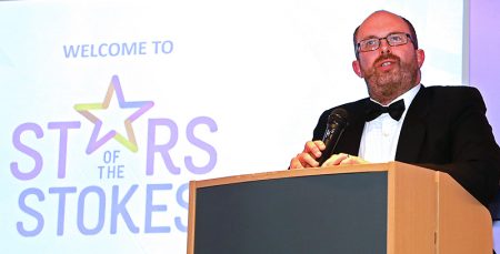 Photo of Andy Wynn speaking at the presentation evening.