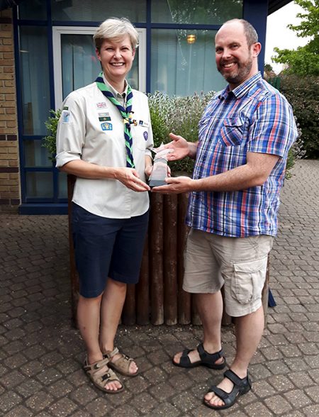 photo of Katherine Robinson receiving her award.