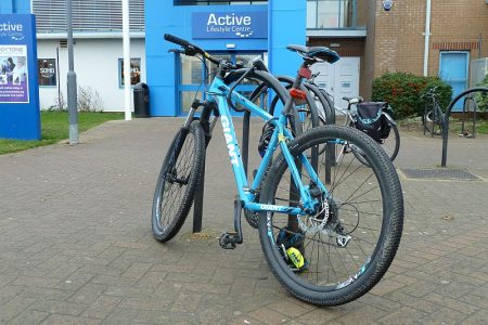 Photo of bicycles parked near the entrance to Bradley Stoke Leisure Centre.