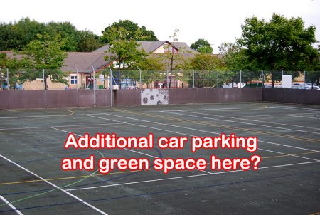 Hard court area with overlay saying@ "Additional car parking and green space here?"