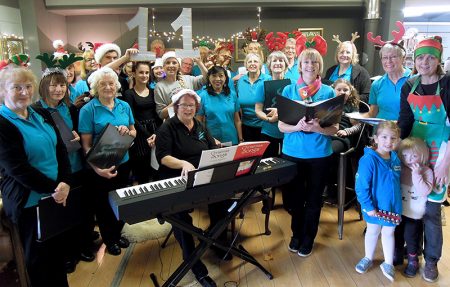 Photo of Stokes Singers performing at Poplars Farm Shop.
