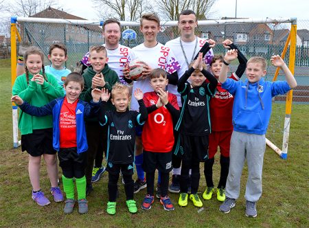 Photo of teachers and pupils prior to the start of the 24-hour football challenge.