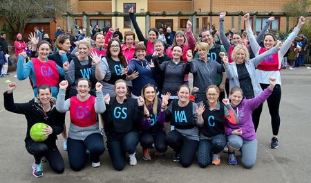 Pre-match photo of the teachers' and parents' teams together.