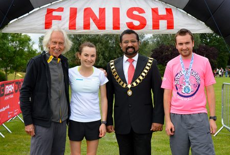 Photo of race winners Helen Newberry (2nd from left) and Sam Cotterell (right).