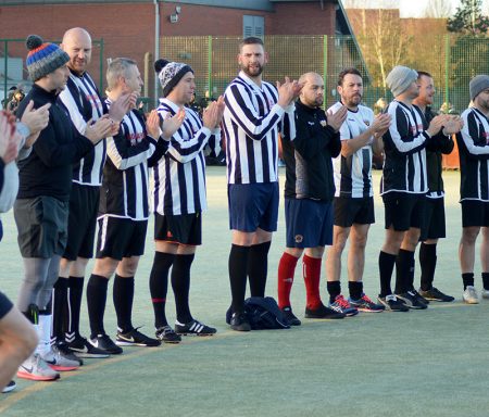 Photo: Players in the Patchway Town FC XI clapping.