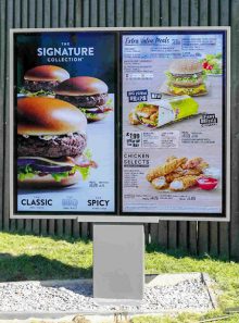 Photo of a McDonald's double digital menu board.