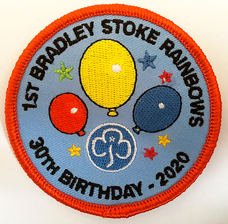 Photo of a 30th birthday badge.