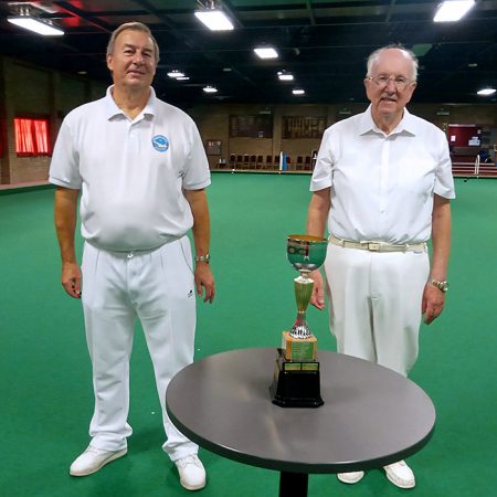 Photo of Men’s Pairs champions Michael Cove (left) and Dennis Overton, with their trophy.