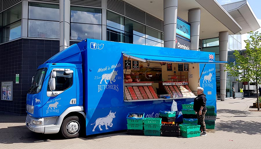 Photo of a mobile butchers van.