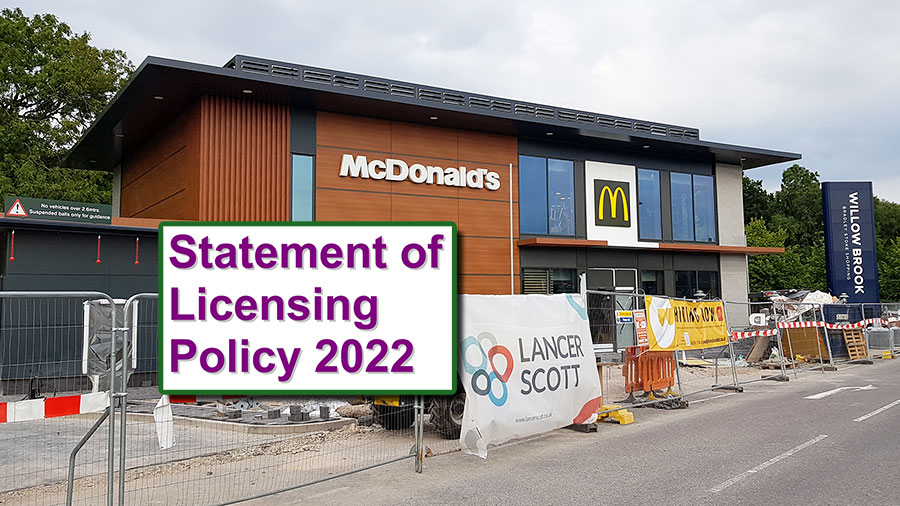 Photo of a building under construction overlaid with a text relating to licensing policy.