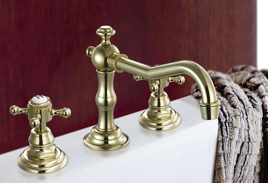 Photo of a bathroom tap set in brass.